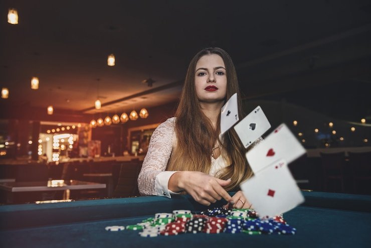 Antarmuka aplikasi goaloo88 menampilkan meja live-dealer blackjack dengan dealer profesional